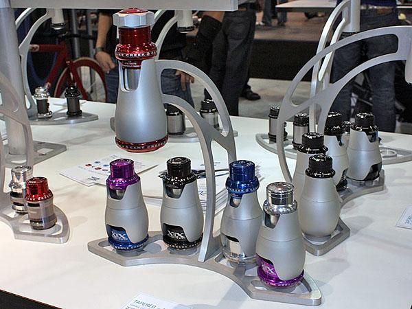 These slick demo displays at the Cane Creek booth show off the various different combinations of tapered headsets available.