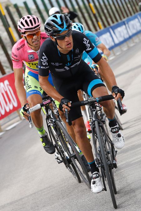 Richie Porte (Team Sky) leads Alberto Contador on the final climb