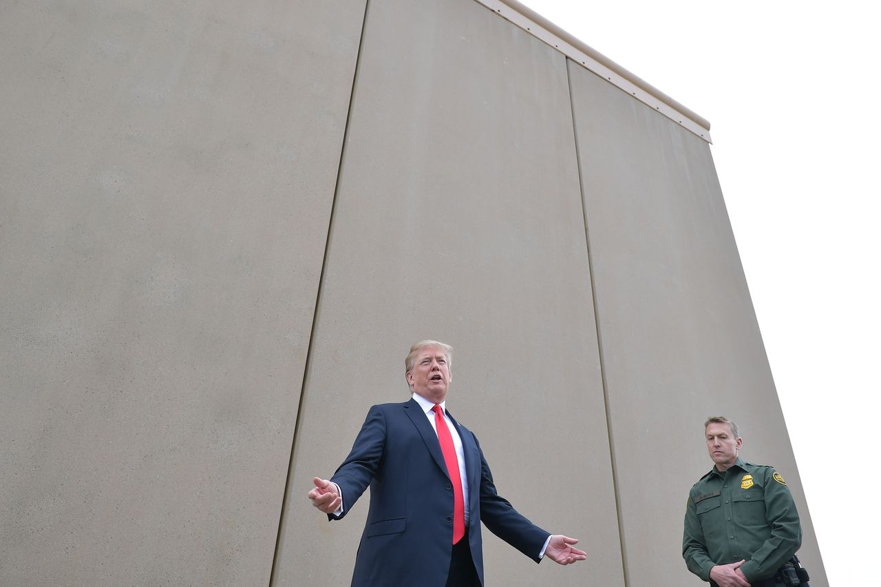 Trump near a border wall prototype