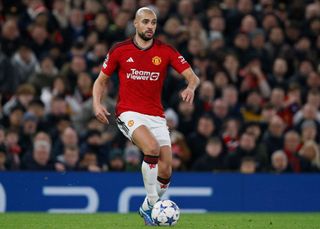 Sofyan Amrabat of Manchester United on the ball during the UEFA Champions League match between Manchester United and FC Bayern Munchen at Old Trafford on December 12, 2023 in Manchester, England. (Photo by Richard Sellers/Sportsphoto/Allstar via Getty Images)