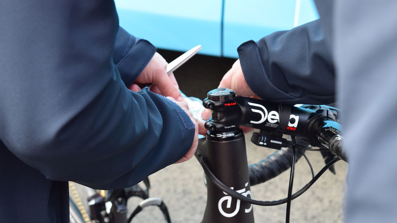 AG2R La Mondiale mechanics add course notes to their riders' frames at the race start