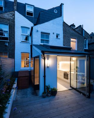 Small addition ideas with a rear extension and a pivot door