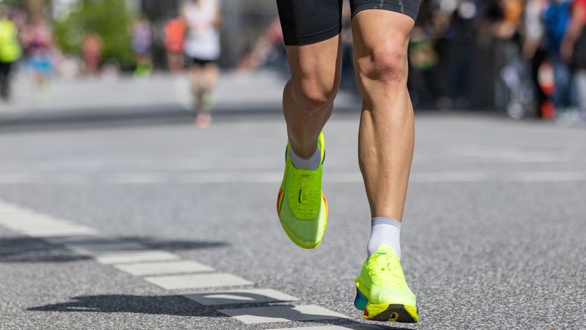 a person with muscular calves running