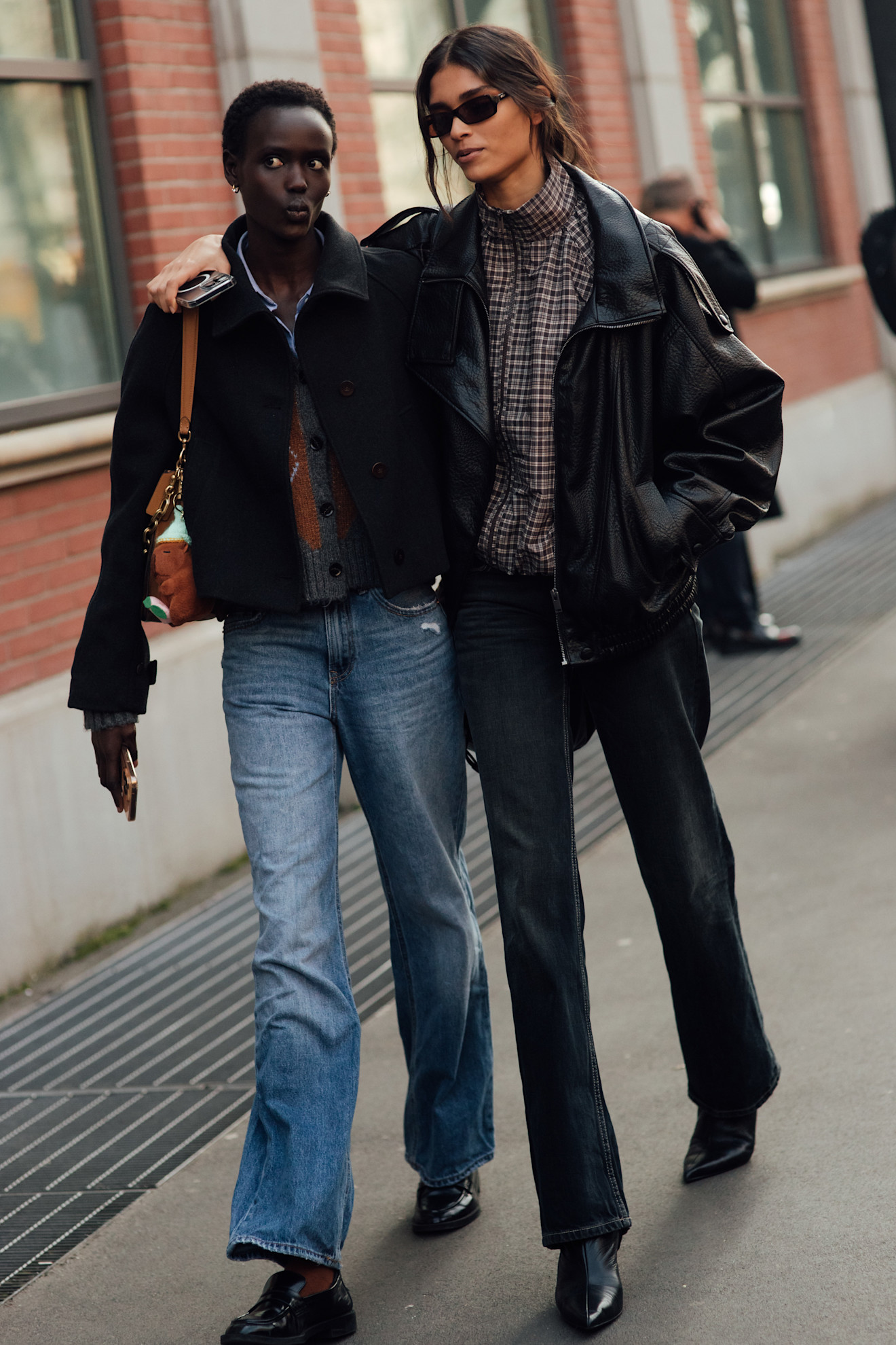 Model wears a leather bomber jacket at Milan Fashion Week