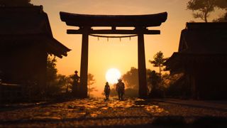 Naoe and Yasuke walk in the sunset in a screenshot from Assassin's Creed Shadows