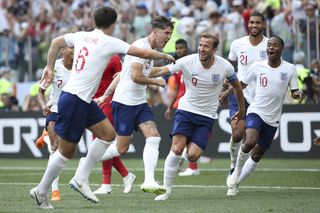 England players celebrate a John Stones goal against Panama at the 2018 World Cup in Russia.