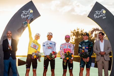 Tadej Pogačar, Isaac del Toro, Richard Carapaz and Mads Pedersen on the final podium of the 2026 Tour de France in Paris