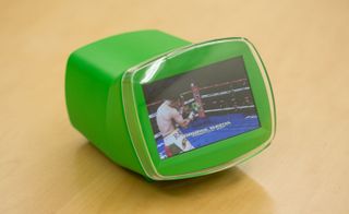 Boxer in a ring in front of spectators on a green screen