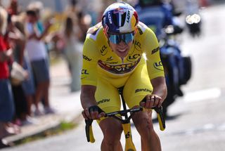 JumboVisma teams Belgian rider Wout Van Aert wearing the overall leaders yellow jersey cycles in a breakaway in the final kilometers of the 4th stage of the 109th edition of the Tour de France cycling race 1715 km between Dunkirk and Calais in northern France on July 5 2022 Photo by Thomas SAMSON AFP Photo by THOMAS SAMSONAFP via Getty Images