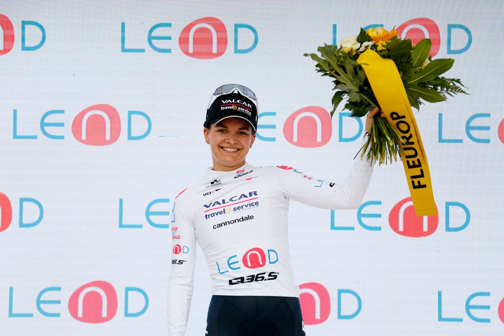 LENZERHEIDE SWITZERLAND JUNE 21 Olivia Baril of Canada and Team Valcar Travel Service celebrates winning the white best young jersey on the podium ceremony after the 2nd Tour de Suisse Women 2022 Stage 4 a 985km stage from Chur to Lantsch Lenz tourdesuisse2022 on June 21 2022 in Lenzerheide Switzerland Photo by Heinz ZwickyGetty Images