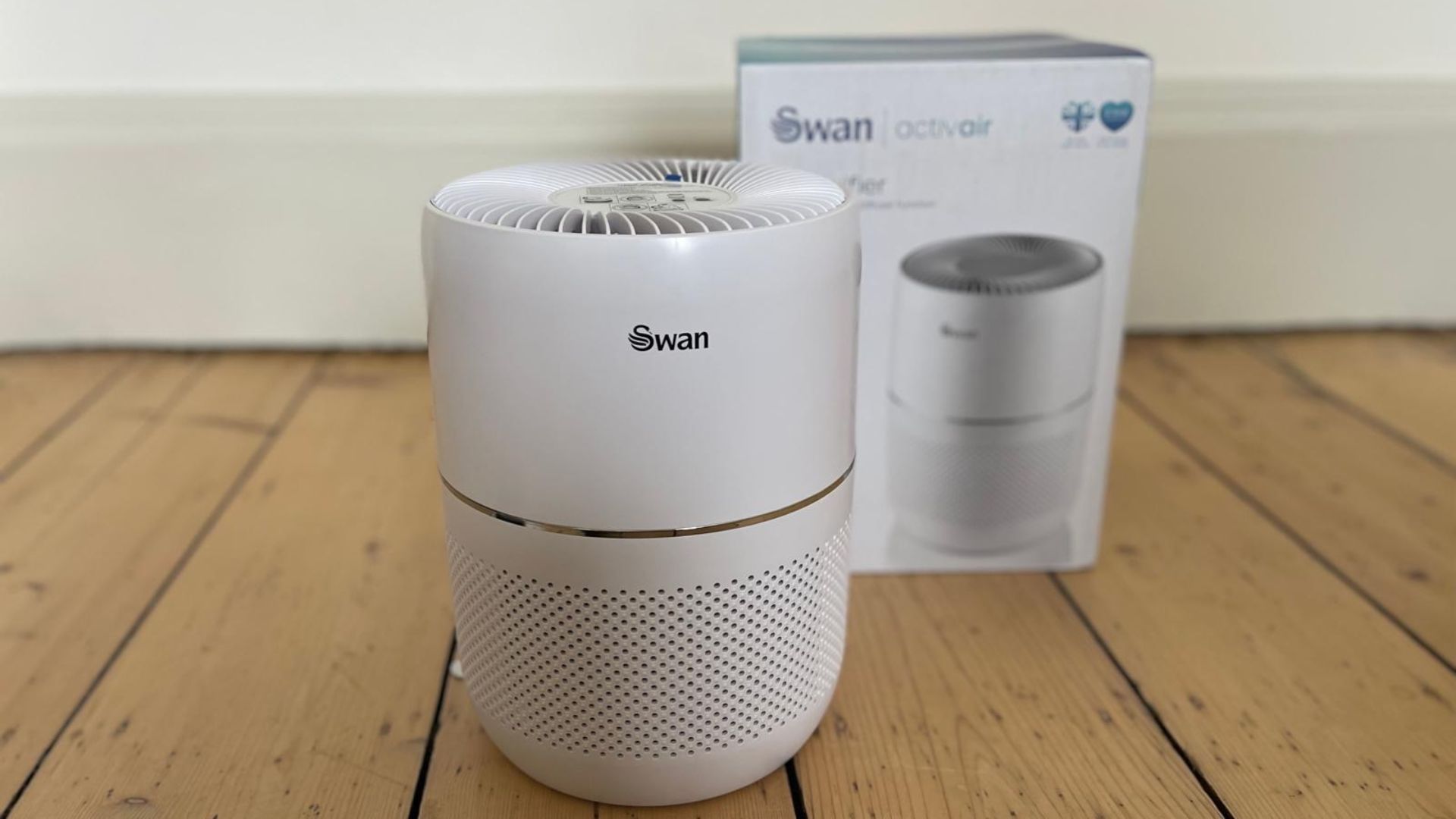 Swan Activair Air Purifier by its box