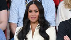 Meghan Markle 'never felt at home' in the UK, author claims. Seen here she attends the sitting volleyball event