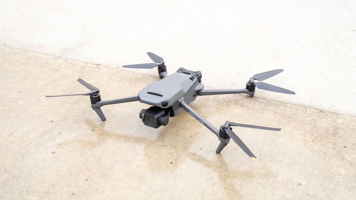 DJI Mavic 3 Classic on top of a table with propellers folded out ready for flight