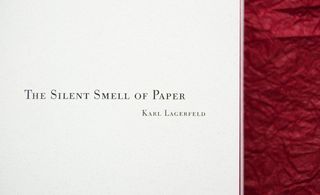 The words "The Silent Smell of Paper Karl Lagerfeld" printed on a book page
