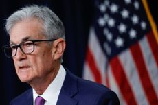 Federal Reserve Chair Jerome Powell speaking at podium after FOMC meeting on May 1