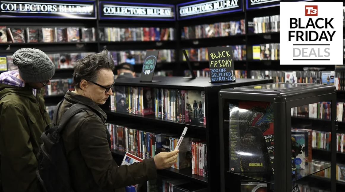 Man browsing for DVDs – with Black Friday sign and T3 Black Friday logo