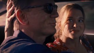 Daniel Craig and Léa Seydoux driving together happily in No Time To Die.