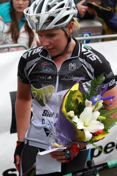 Belinda Goss with her winner's flowers