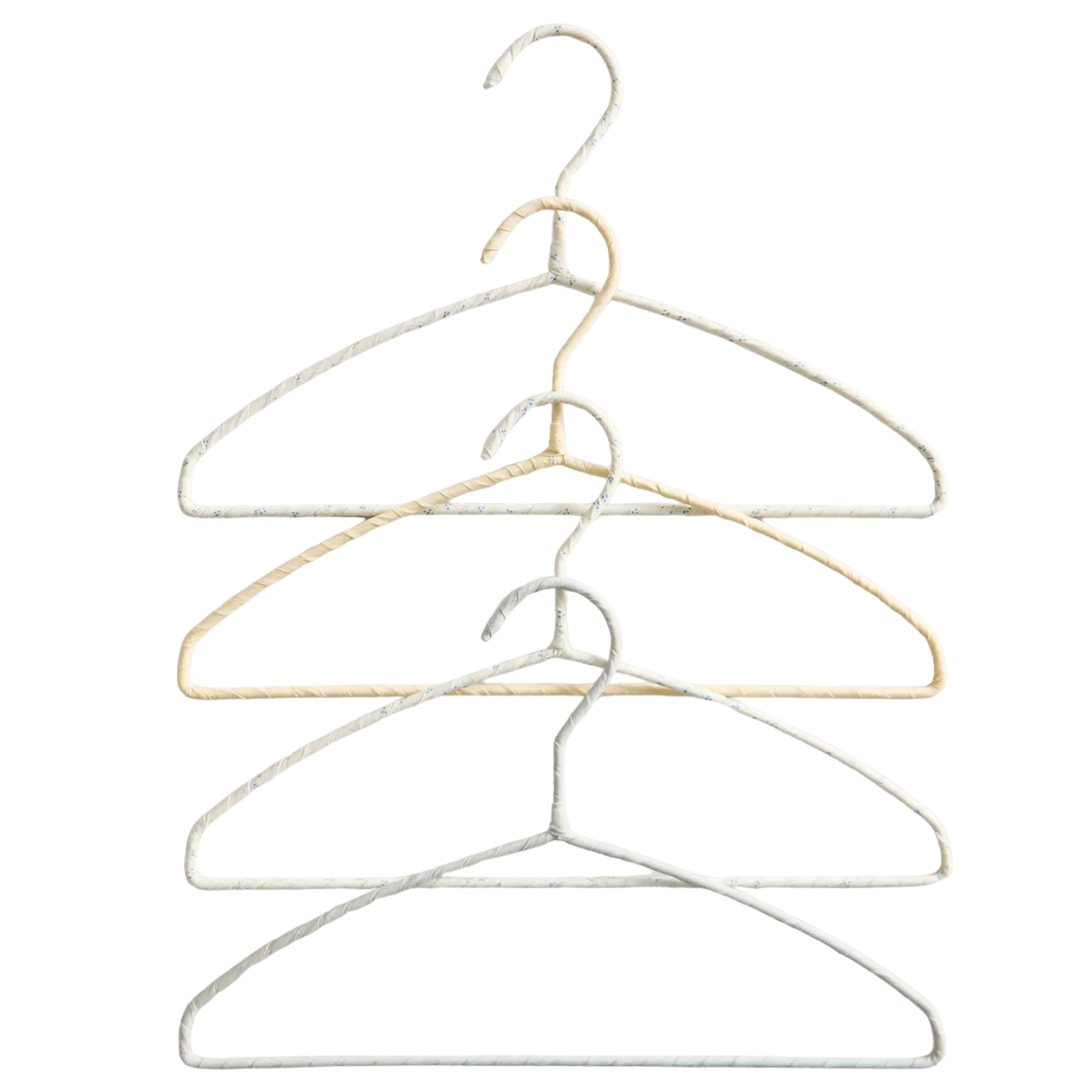 A set of four lined kids hangers