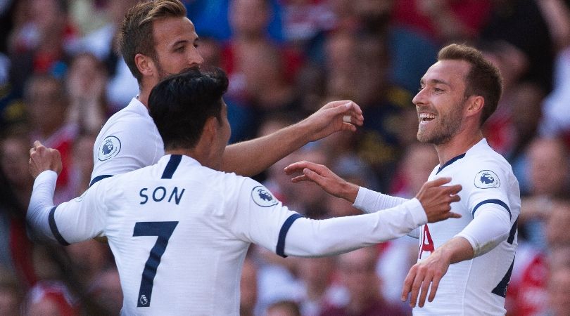 Harry Kane, Son Heung-min and Christian Eriksen celebrate a Tottenham goal against Arsenal at the Emirates Stadium in 2019.