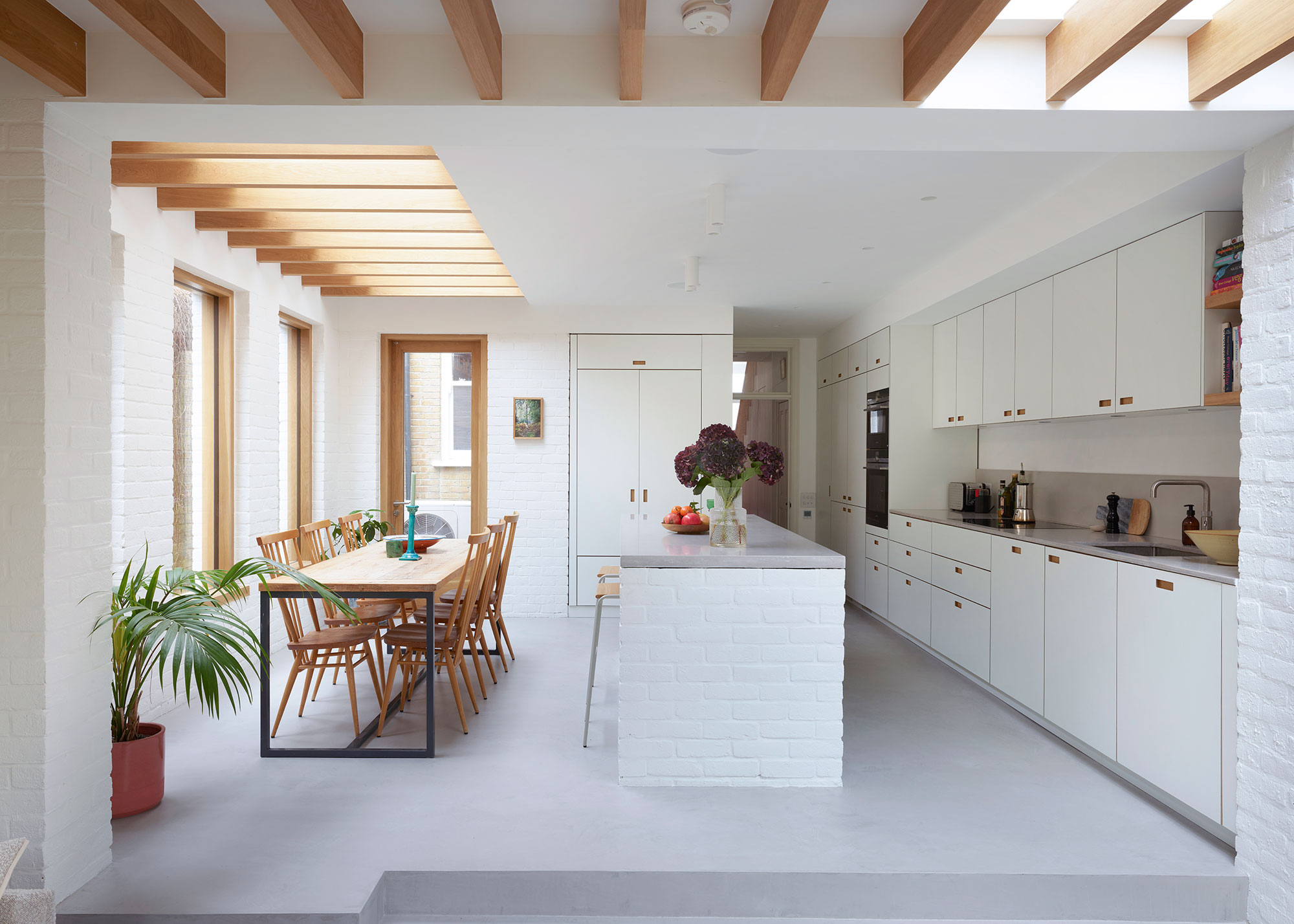 white kitchen with concrete worktops