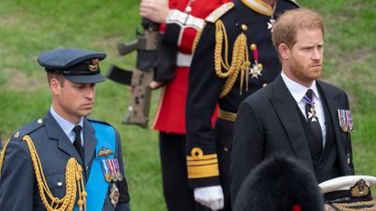 Prince William, Prince of Wales and Prince Harry, Duke of Sussex at Windsor Castle on September 19, 2022 in Windsor, England. The committal service at St George's Chapel, Windsor Castle, took place following the state funeral at Westminster Abbey. A private burial in The King George VI Memorial Chapel followed. Queen Elizabeth II died at Balmoral Castle in Scotland on September 8, 2022, and is succeeded by her eldest son, King Charles III