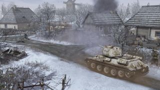 A tank rolling through the snow