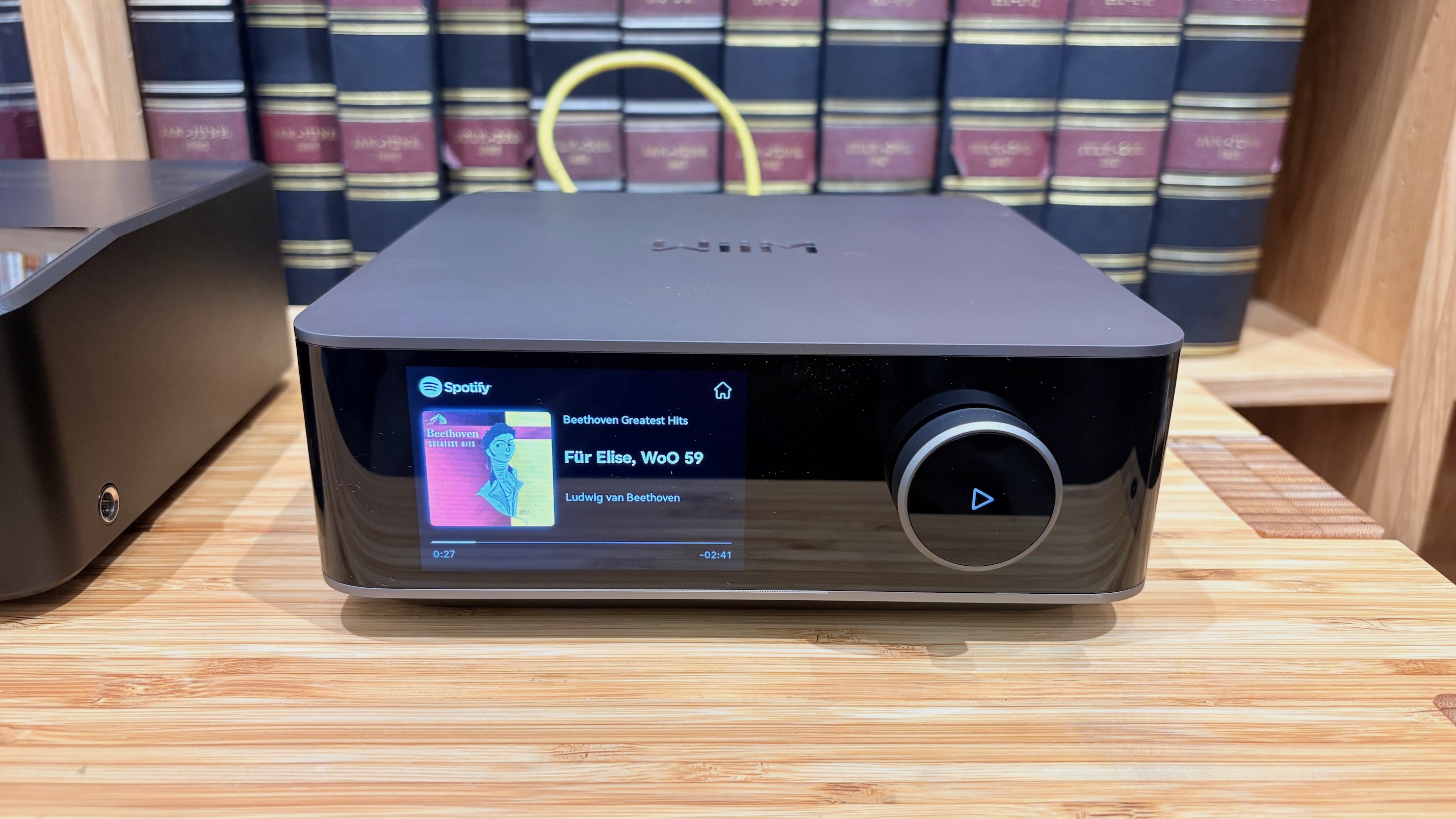 A WiiM streamer with Beethoven on screen playing through Spotify Connect.