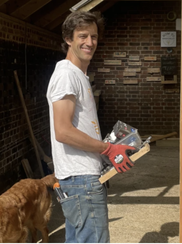Justin Kelly in white t-shirt and jeans 