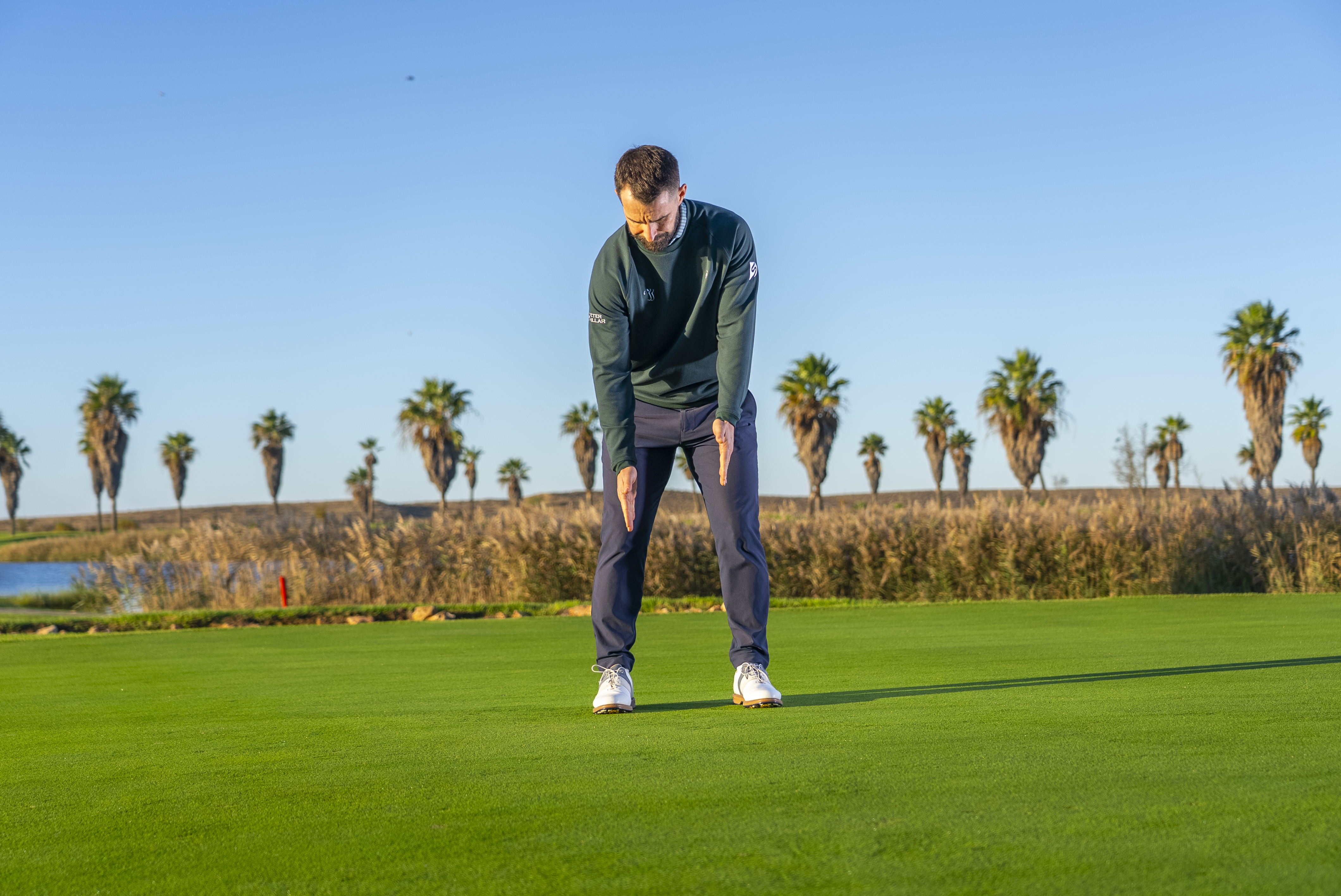Putting Specialist Coach James Jankowksi demonstrating a drill that focuses on connection and rhythm when putting