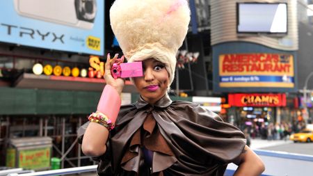 Nicki Minaj helps Casio unveil their new TRYX digital camera billboard at Times Square on April 7, 2011 in New York City.