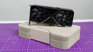 An Nvidia GeForce RTX 5070 sitting on top of its retail packaging