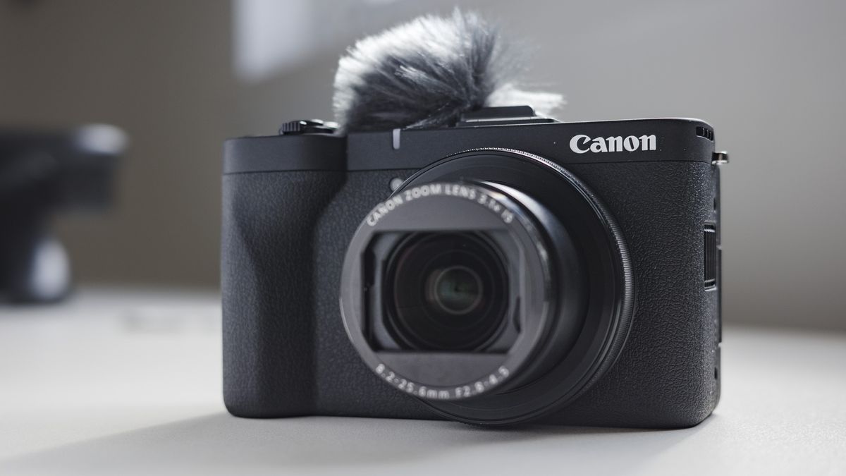Canon PowerShot V1 compact vlogging camera on a white desk