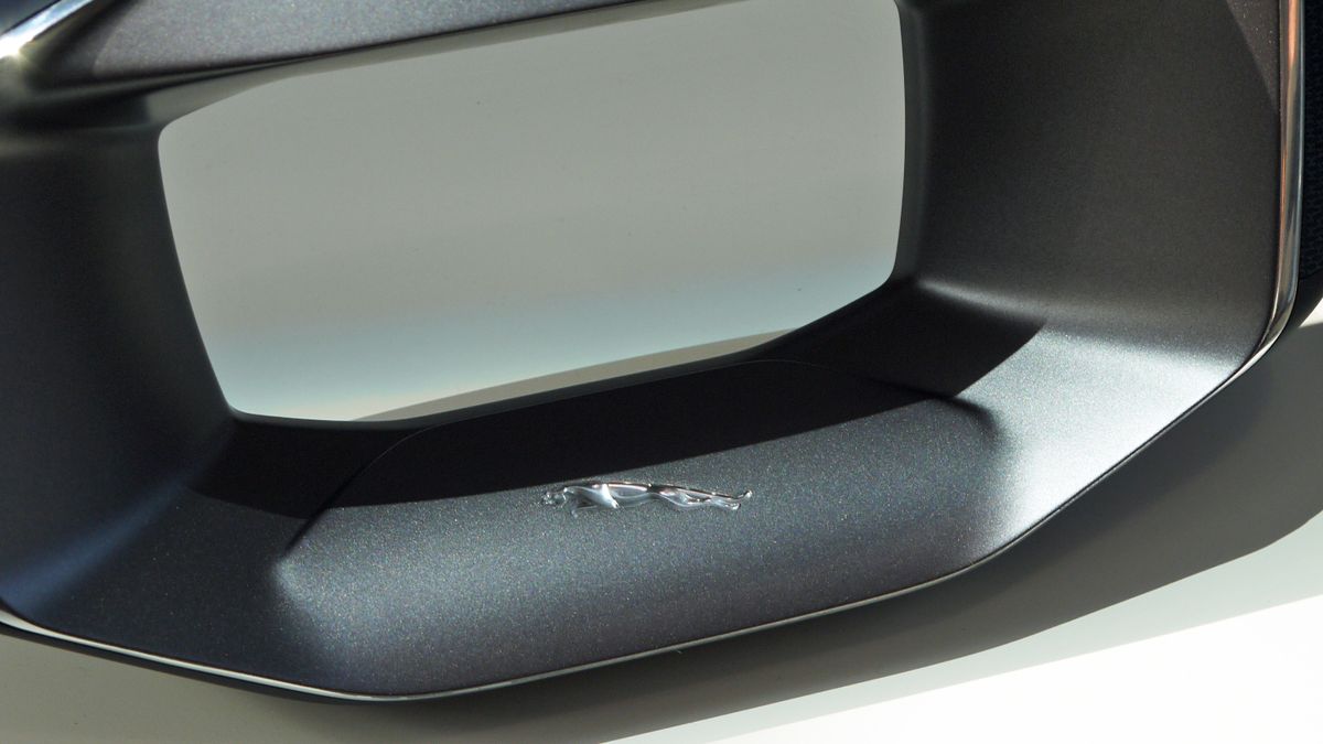 The hole in the middle of the wheel fits around the digital cockpit display in the car