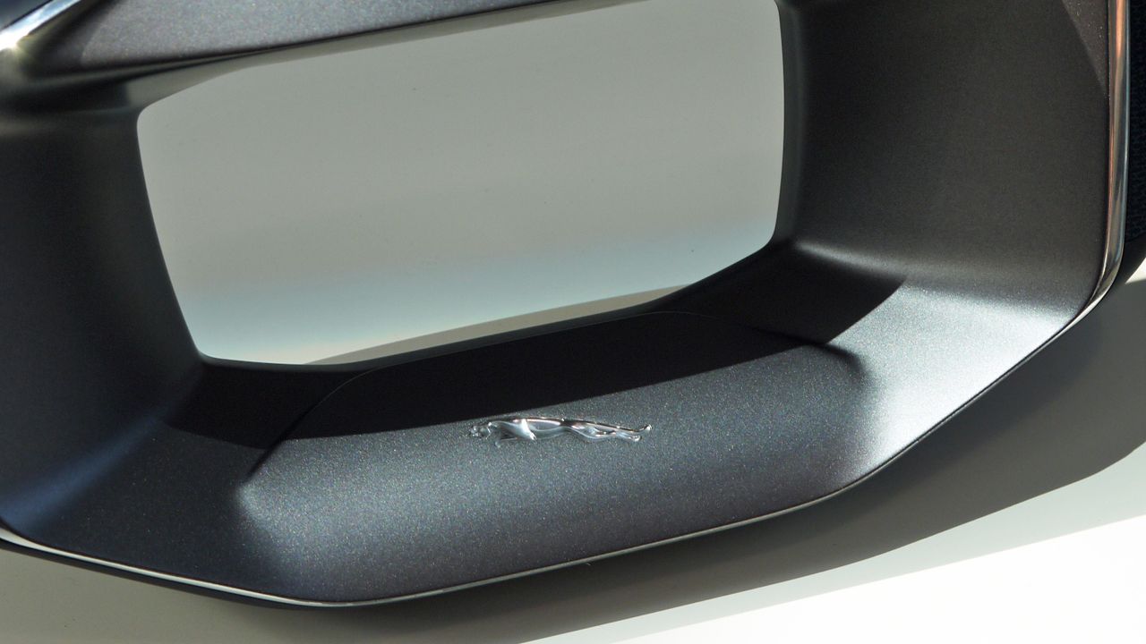 The hole in the middle of the wheel fits around the digital cockpit display in the car