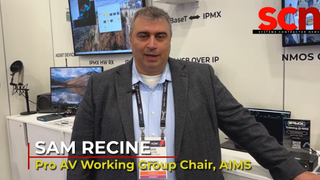 Sam Recine, the Pro AV Working Group Chair for the AIMS Alliance and a VP of sales for Matrox Video at NAB Show booth. 