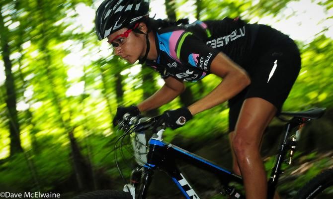 Kaylee Blevins (Trek) focusing on the many rocks in the trail