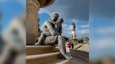 This statue in Skopje, North Macedonia, shows Alexander the Great as a baby in the hands of her mother Olympias.