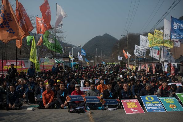 Protesters in South Korea against the THAAD system.