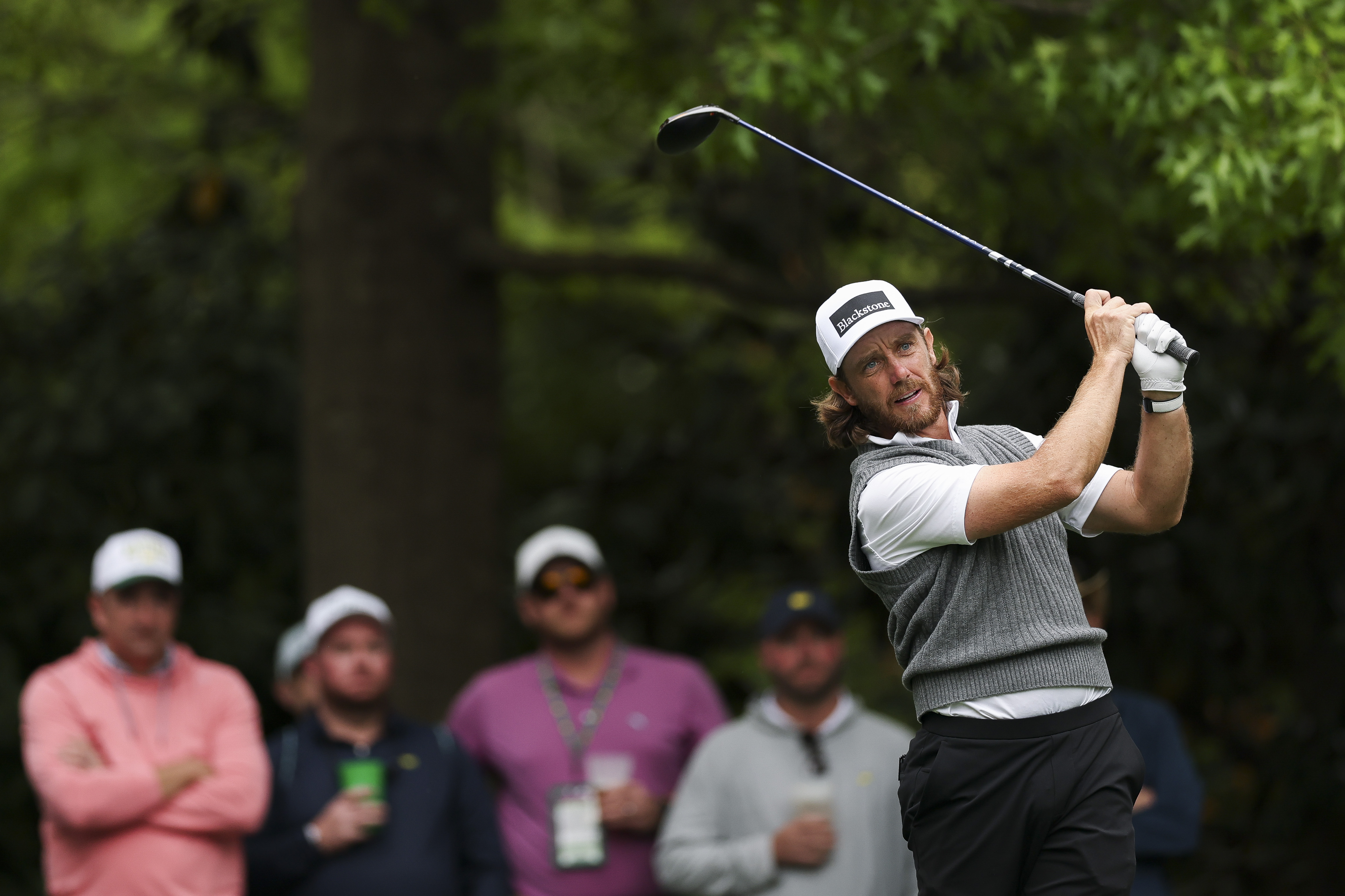 Tommy Fleetwood plays a shot from the seventh hole tee box during a practice round prior to the 2026 Masters Tournament at Augusta National Golf Club