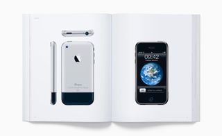 View of two pages inside the 'Designed by Apple in California' book featuring photos of the 2007 iPhone