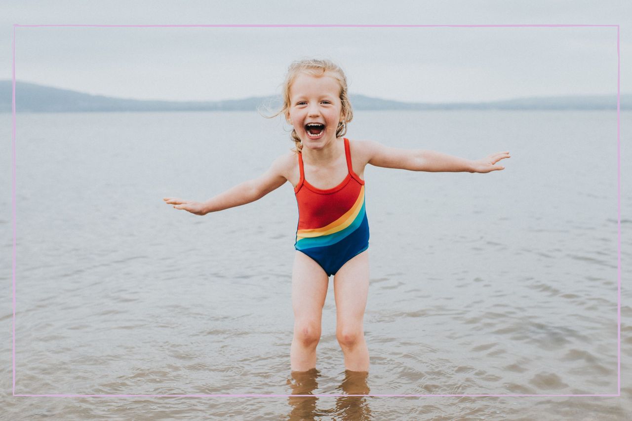 child swimming in the sea