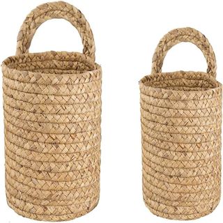 two wicker hanging baskets, one large one medium