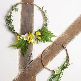 wooden beam with yellow flower and green leaf