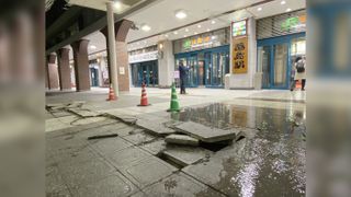 A magnitude-7.3 earthquake just hit Fukushima, with damaged pavement blocks on the ground in front of JR Fukushima Station, shown here on March 17, 2022.