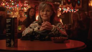 Tova (Sally Field) watches a performance in a bar in Remarkably Bright Creatures.