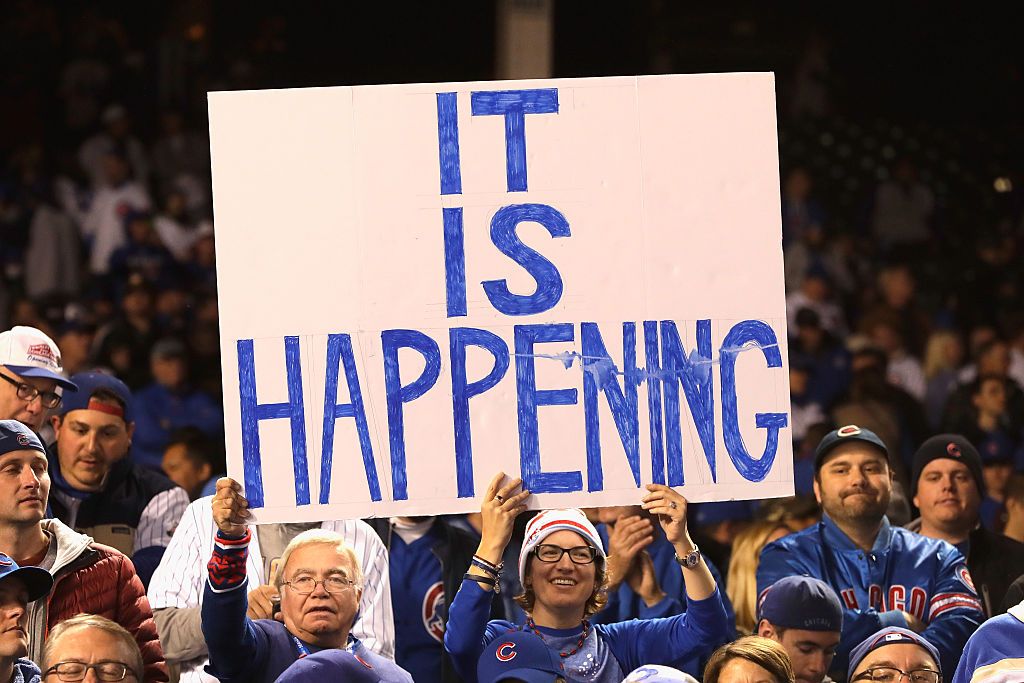 A fan watches the Chicago Cubs win the National League Championship