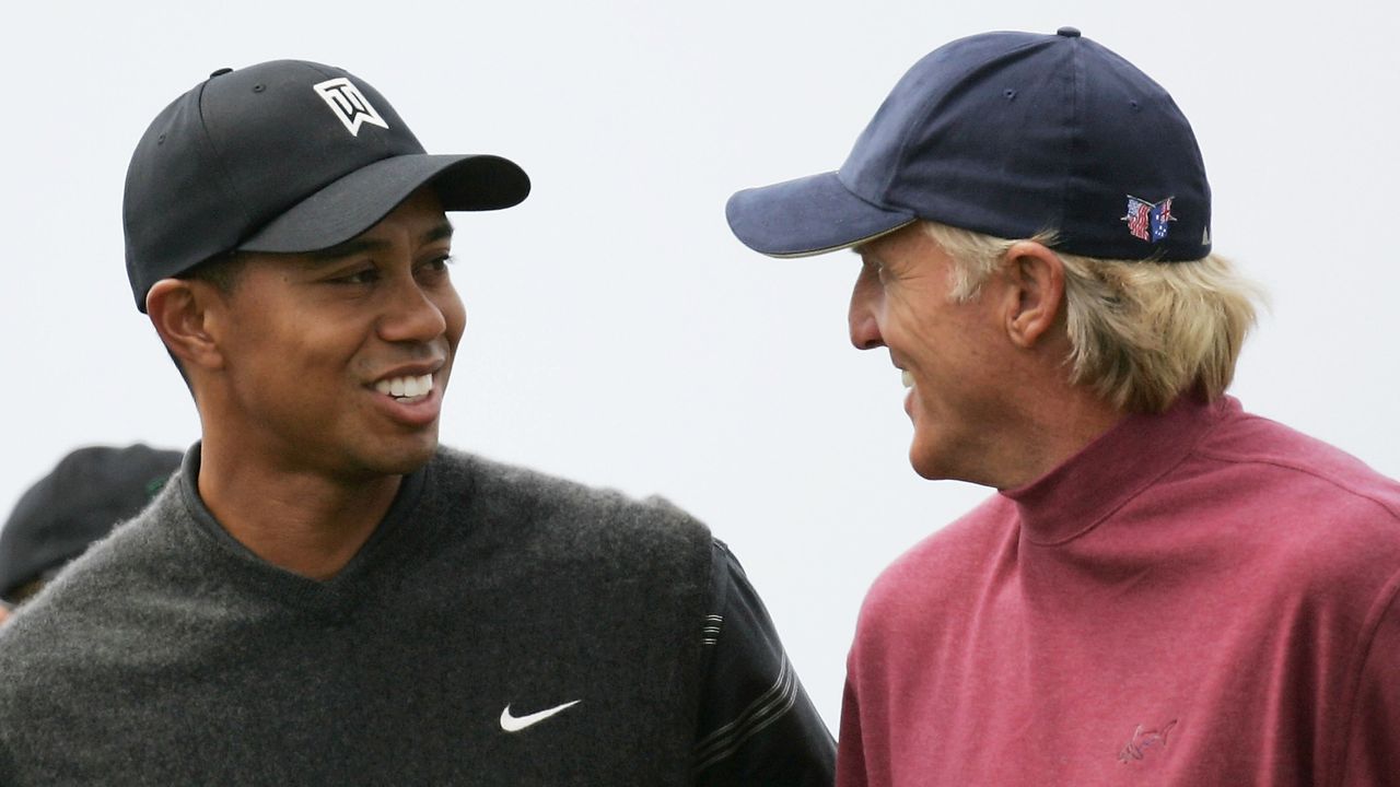 Tiger Woods and Greg Norman in 2004