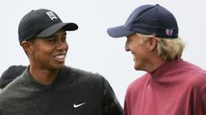 Tiger Woods and Greg Norman in 2004
