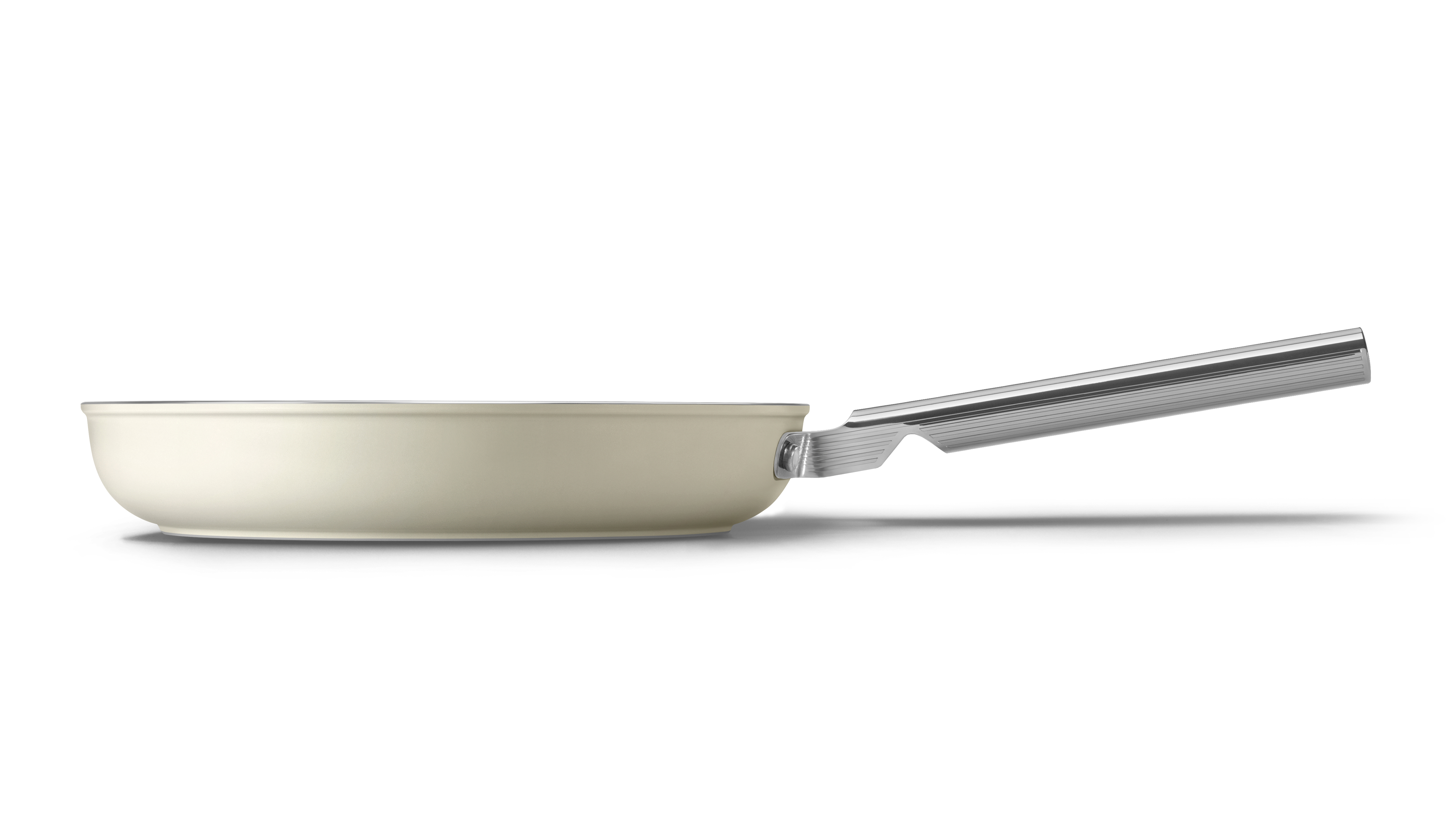Smeg non-stick frying pan in cream finish on white background. Also available in black and red